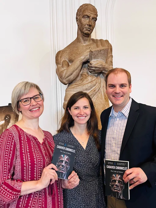 Nathalie Wheaton, Rush University Medical Center archivist with authors and professors Alexandra Daemicke and Adam Wilson at the International Museum of Surgical Sciences celebrating their new novel, “The Cadaver Chronicles: The Code of Silence.” We’re standing in front of statue of anatomy pioneer, Galen, whose name is featured in the story. 