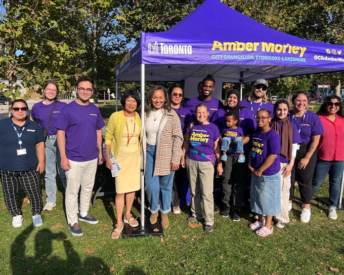 Mayor Olivia Chow and Deputy Mayor Amber Morley stand with volunteers at Fall Fest.