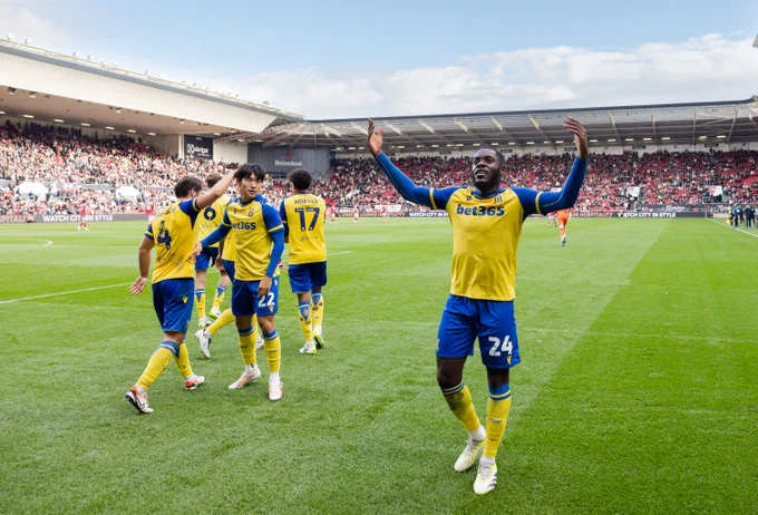 Junior Tchamadeu celebrates in front of the Stoke City supporters at Ashton Gate.