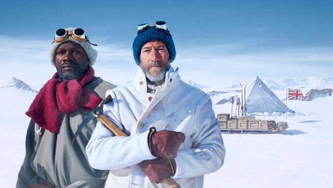Ben Fogle and Dwayne Fields wearing winter gear, stood in a snowy landscape