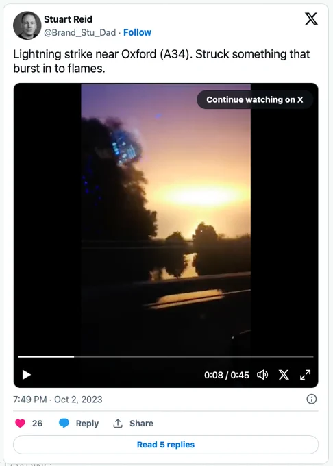A freeze frame from a video posted on Twitter showing the explosion between two trees on the far side of a river from the A34.