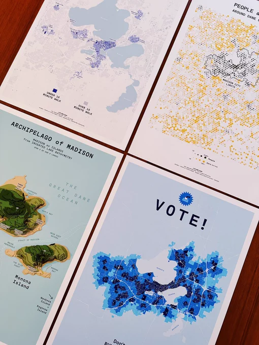 Prints of maps depicting Madison WI in different ways, including maps titled:
“Don’t walk, RUN to the polls!”
“Archipelago of Madison”
“People & Corn”
“15 Minute Cities”