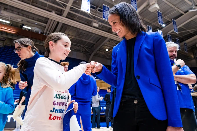 Nina King fist bumps a young fan.