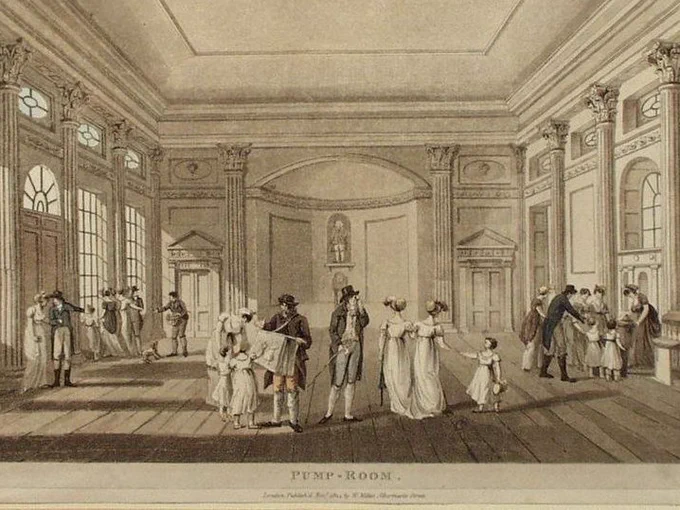 An early nineteenth-century engraving of the Pump Room in the English city of Bath. People are milling around or chatting in groups. Tall window let in a lot of sunlight. The women wear flowing white dresses, and a few children are also shown. The Bath Pump Room was built in 1795.