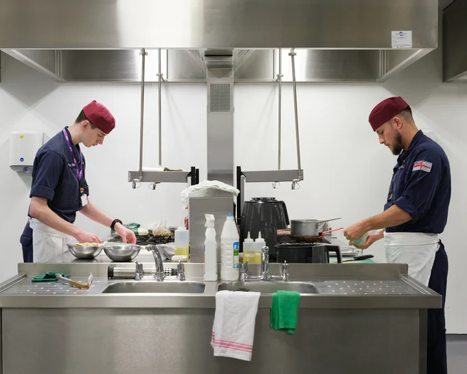 Royal Navy candidates cooking in our campus kitchen.