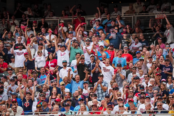 Fans cheer at Target Field.