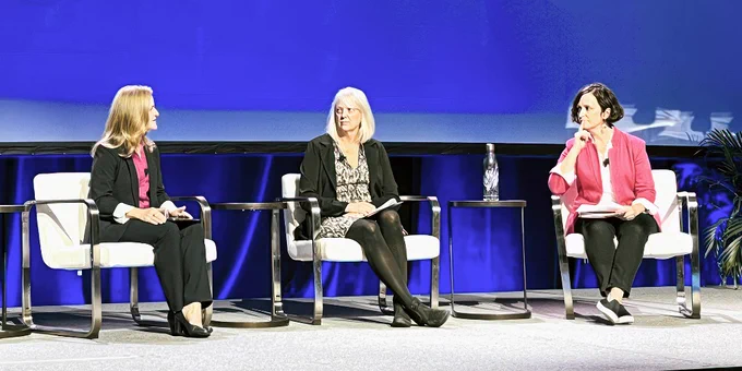 Images of Liz Klein speaking at the American Clean Power (ACP) conference. In the first image, she joins the Assistant Administrator of NOAA Fisheries to discuss ways that clean energy can address the climate crisis. In the second image, she joins the Assistant Secretary for Energy, Installations and Environment of the U.S. Navy to discuss issues related to offshore wind development and national security. 