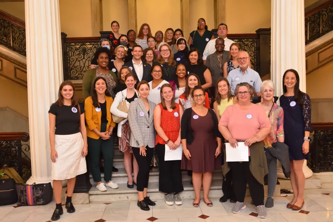 Social Workers gathered for a photo inside the State House at the SUPER Act mini lobby day.