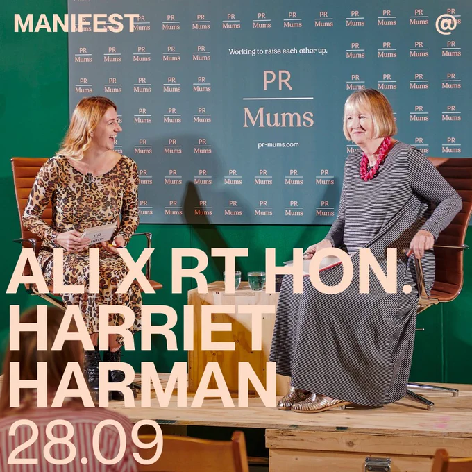 Two women having a conversation on stage