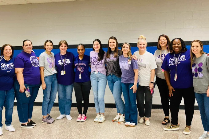 Group of educators on college colors day