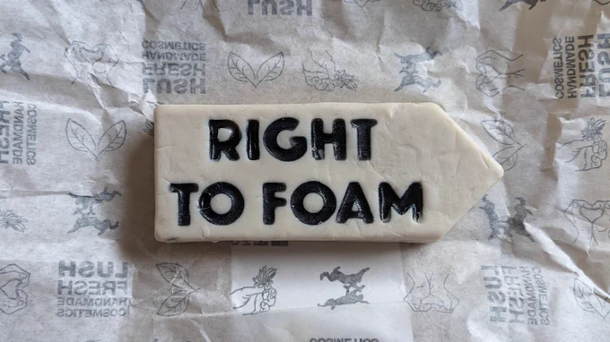 Bar of soap in the shape of a direction sign with the words 'RIGHT TO FOAM' on it.