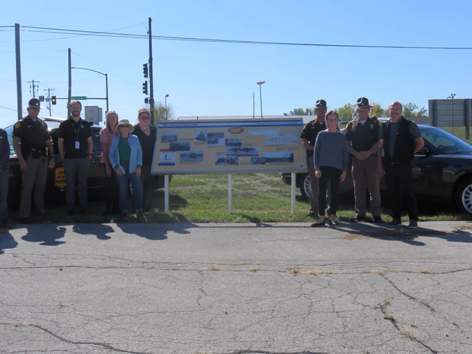 Left to right: Trp Jessie Drahos, Linn County Planning and Dev. Bradley Wylam, LCHPC members Barb Westercamp and Nancy Kraft,  Linn County Supervisor Kirsten Running-Marquardt.  Right side is Lt Greg Obbink, LCHPC President Maura Pilcher, Trp Bob Conrad, LCHPC member Todd McNall, and (photo creds: not pictured) LCHPC member Steven Ciha 