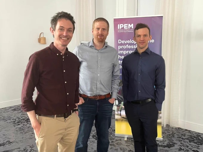 A photo of Marytn, Rhydian and Russell at the radiotherapy quality improvement event