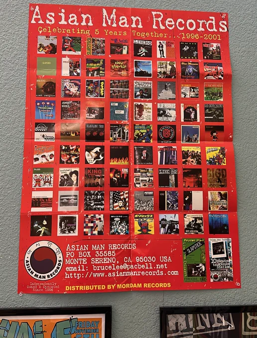 Asian man records five year poster