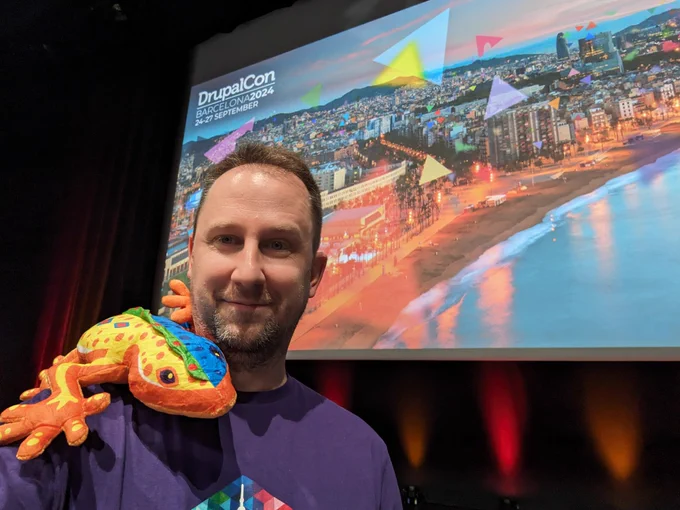 Gábor Hojtsy with the mascot for DrupalCon Europe 2024