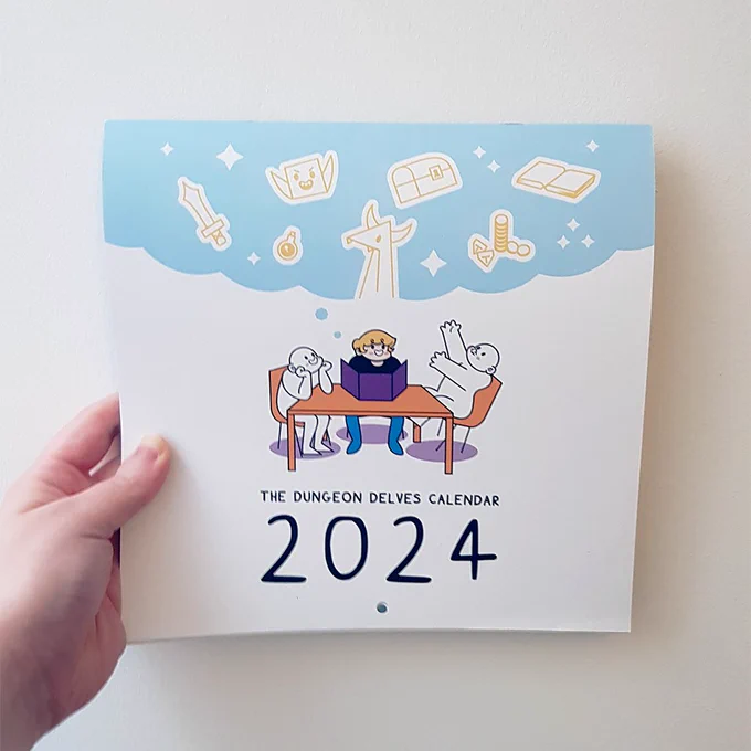 "The Dungeon Delves Calendar 2024"

Image of a hand holding up a calendar against a white wall.
