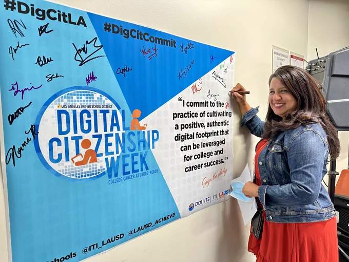 Photo of leader signing their #DigCitCommit
