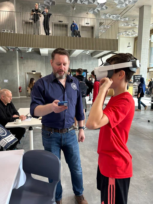 A student trying out the Empaytheyes headset. 