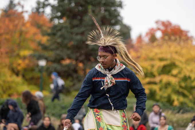 Students celebrating Indigenous Peoples Day at the University of Oregon during the tribal flag ceremony.