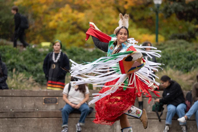 Students celebrating Indigenous Peoples Day at the University of Oregon during the tribal flag ceremony.