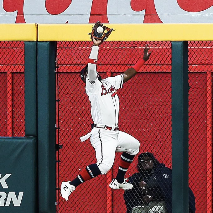 Mike Harris makes a game-winning catch in center field.