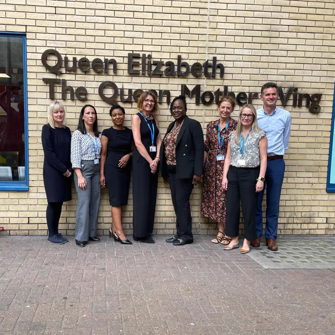 Image shows colleagues outside the Queen Elizabeth, The Queen Mother Wing at Imperial College Healthcare NHS Trust