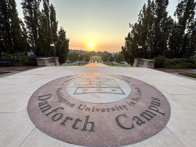 A beautiful, sunrise view of the Computer Science & Engineering building from Brookings Hall. The department is in McKelvey Hall, which is just below and to the left of the sun.