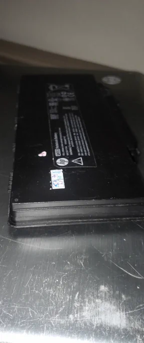 Swollen Battery, needs replacement.