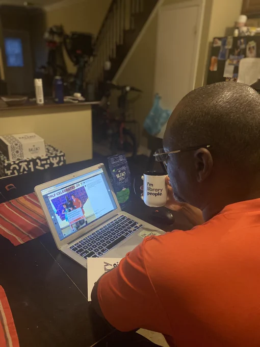 Drinking a cup coffee in front of my computer