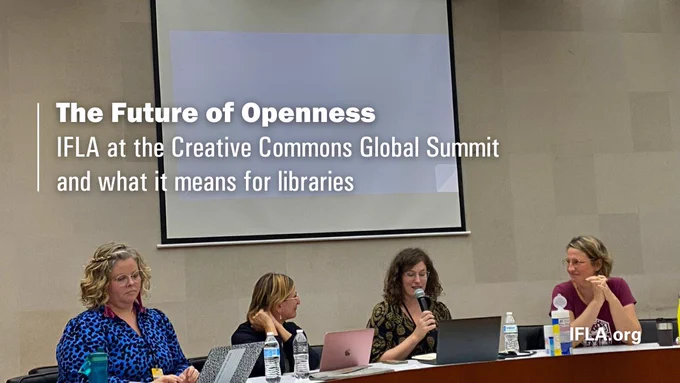 Picture of IFLA team member at Creative Commons event sitting with colleagues around a table