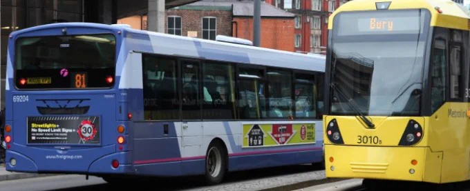 Image of 2 buses passing each other.  