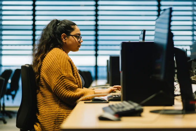 Photo of BCU student using a computer.