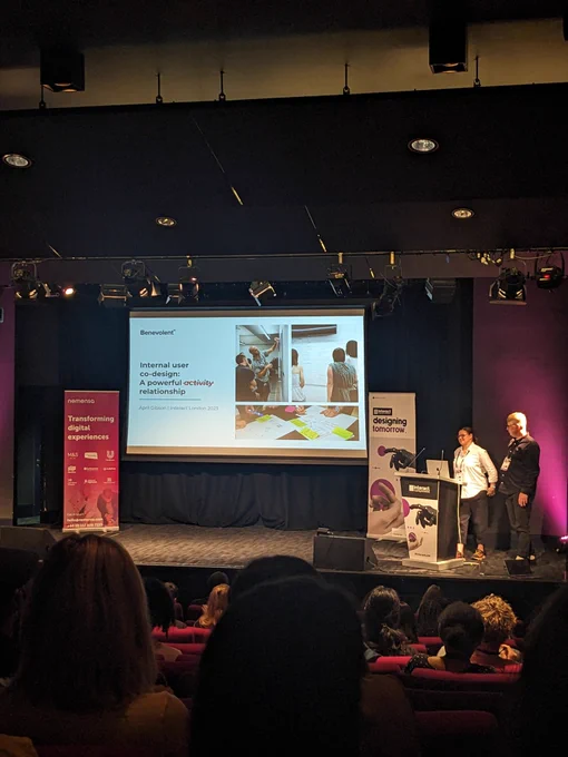 April on stage at Interact London. Talk title provided in tweet