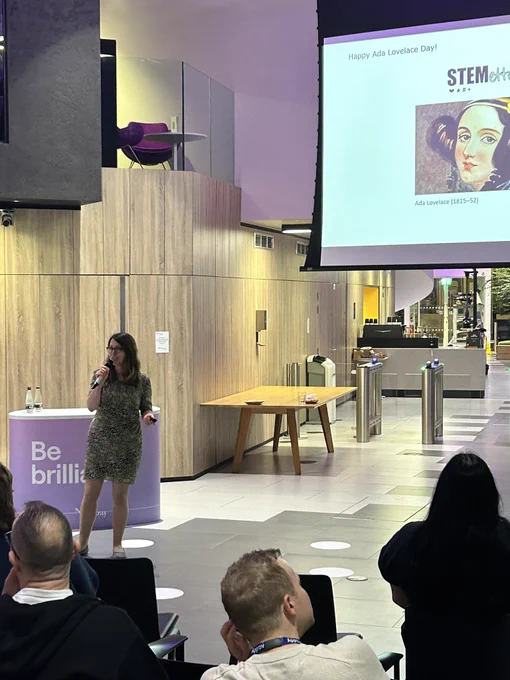 Anouski Roberts, Head of Engagement, Inclusion   Diversity @ NewDay speaking on stage