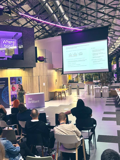 Speaking infront of a large screen