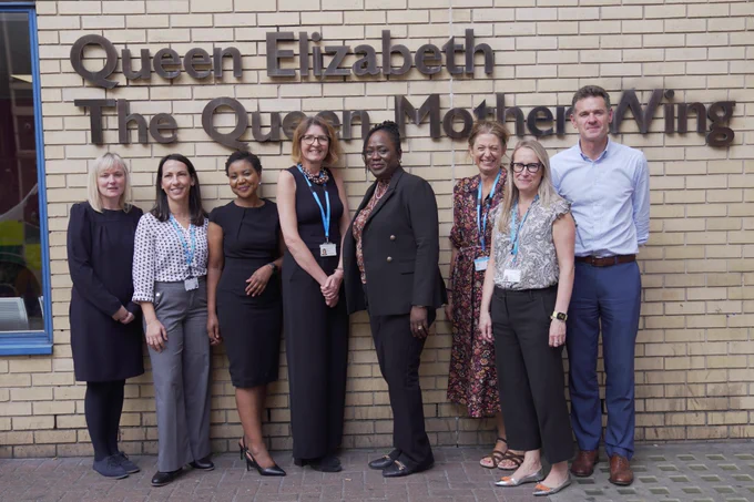 Image shows colleagues outside the Queen Elizabeth, The Queen Mother Wing at Imperial College Healthcare NHS Trust