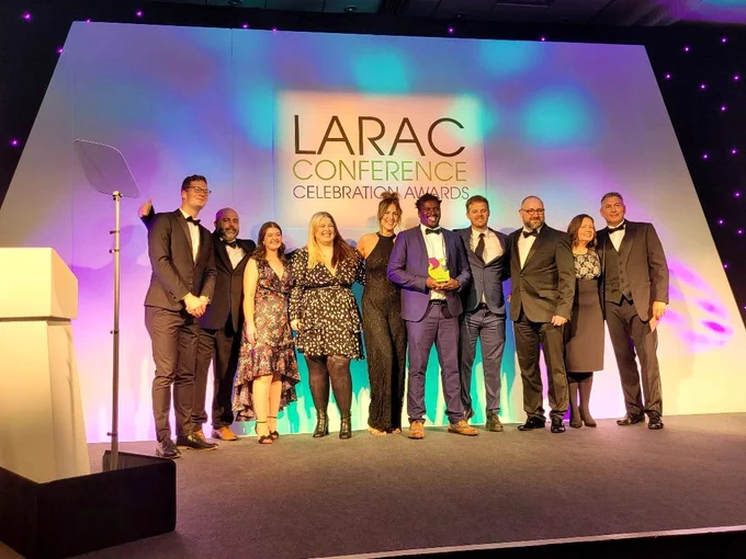 Our team on the stage receiving their awards