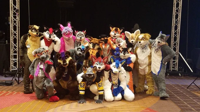 Fursuit group photo of fursuits from the same maker, DTWA, at furfest 2016