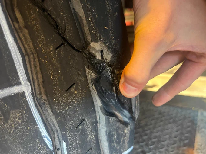 Tyre damaged, cords exposed