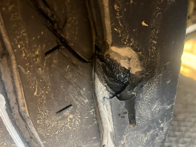 Tyre damaged, cords exposed