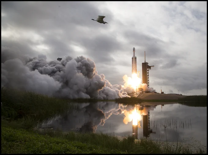 A SpaceX Falcon Heavy rocket with the Psyche spacecraft onboard is launched from Launch Complex 39A, Friday, Oct. 13, 2023, at NASA’s Kennedy Space Center in Florida. NASA’s Psyche spacecraft will travel to a metal-rich asteroid by the same name orbiting the Sun between Mars and Jupiter to study it’s composition. The spacecraft also carries the agency's Deep Space Optical Communications technology demonstration, which will test laser communications beyond the Moon. Photo Credit: (NASA/Aubrey Gemignani)