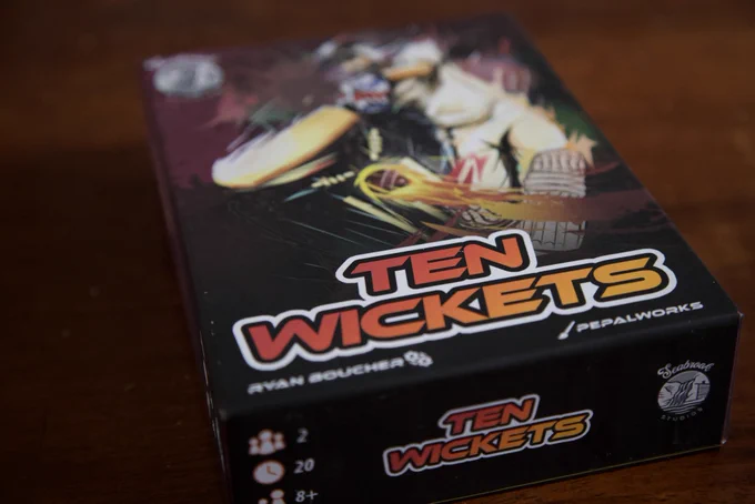 The game box for Ten Wickets lying on a table