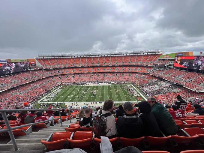 Browns stadium with teams practicing on field