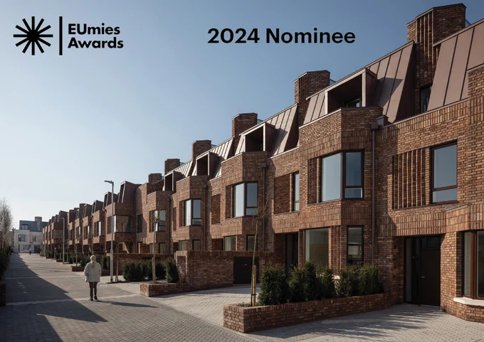 This new street was created by transforming a highly-constrained backlands site and turning it into 20 modern family homes that are sympathetic to the surrounding character of the area; including projecting bay windows, recessed entrance thresholds and individual ‘light chimneys’. Increasing densities close to existing services and transport links delivers on the government’s aspiration to build 40% of new homes within the built-up footprint of existing settlements. 

#miesvanderroheawards2024 #EUmiesAwards2024 #Architecture #Emerging
