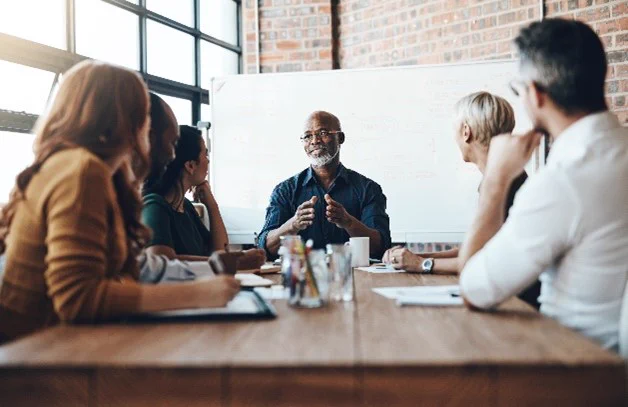 Group of professionals discussing business.