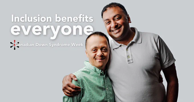 The words Inclusion benefits everyone appear above the CDSS daisy logo and smaller white text that reads: Canadian Down Syndrome Week. Two adult brothers stand smiling into the camera, the taller of the two with his arm around the other. 
