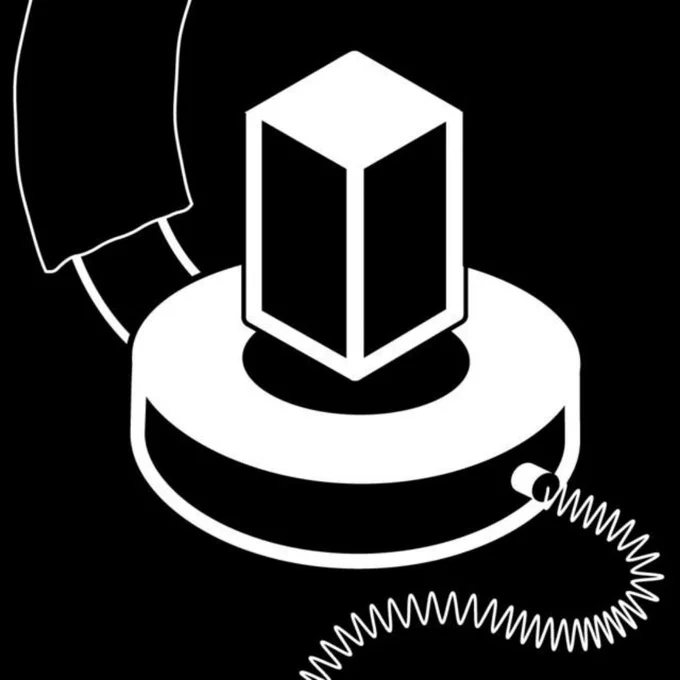 A black-and-white image of a headphone with a wire attached at the end. There is a rectangular cube on top of the earpiece. 