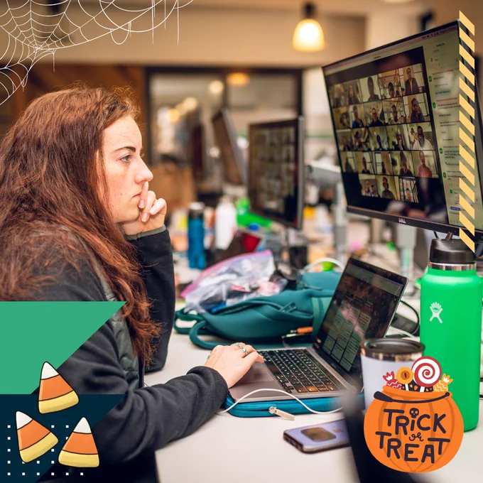 A woman working on a laptop and participating in a virtual learning session.