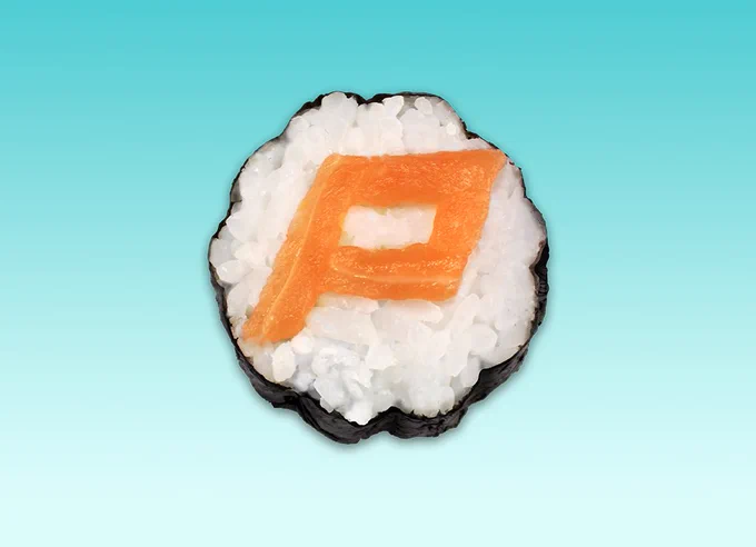An individual sushi roll with the Panic logo made with salmon.