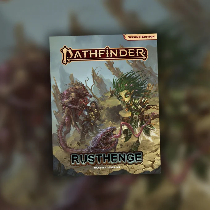 Rusthenge cover. Lini the gnome and Valeros the human fight off monsters in a blasted landscape.